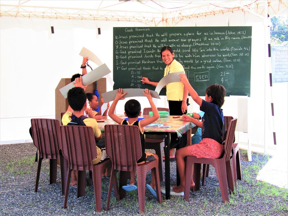 CEA children with Gigi Brown during a math lesson April 7 2020