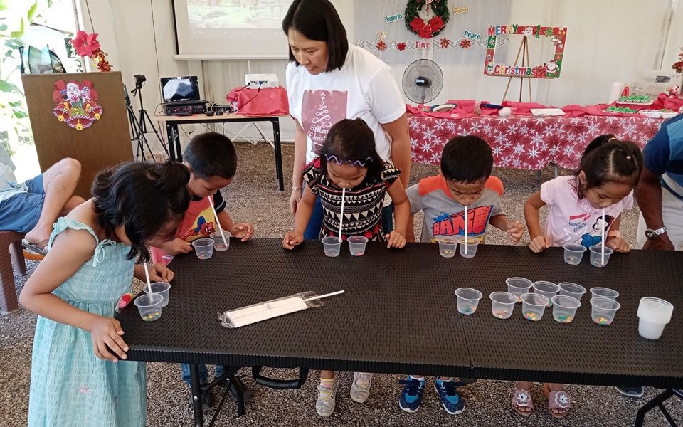 The children playing one of the games.