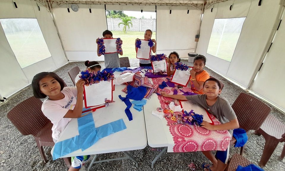 CEA children recycling fabric scraps