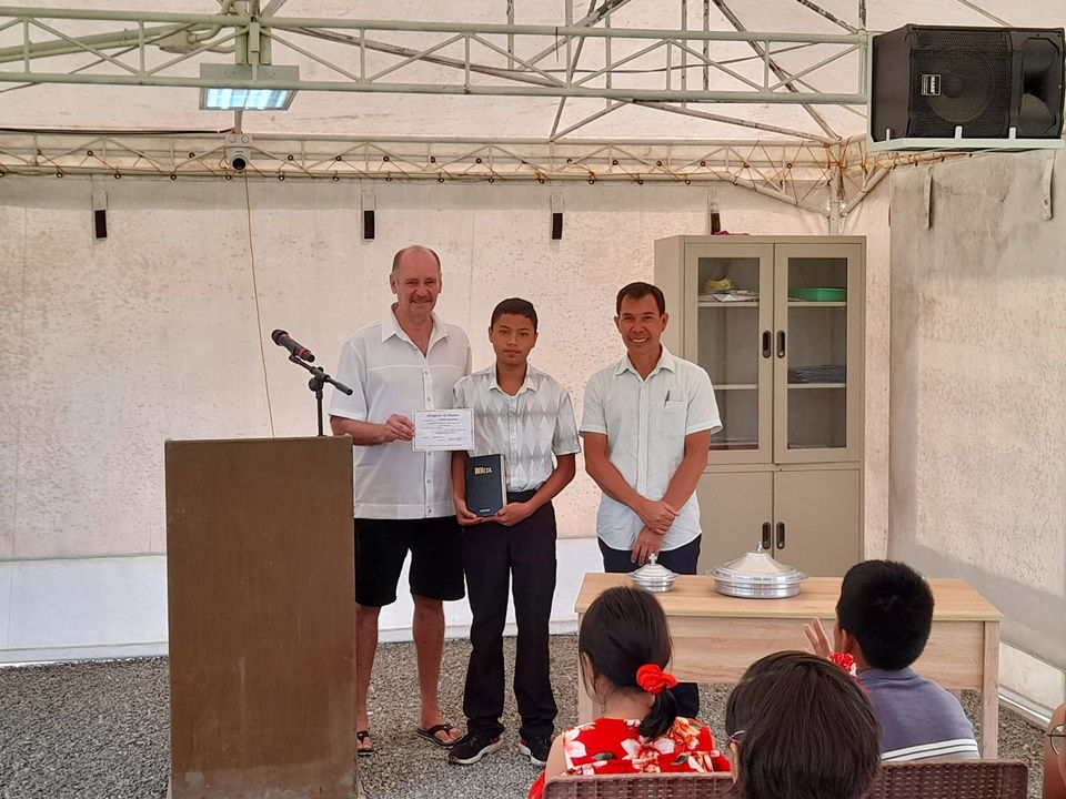 Giving of certificates and Bibles after baptism