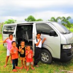 The CEA kids excitedly looking over their new transport van, February 2020). CEA children transport vehicle 1