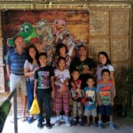 The children posing here with Ron, Gigi, our mom Pat, and the house parents